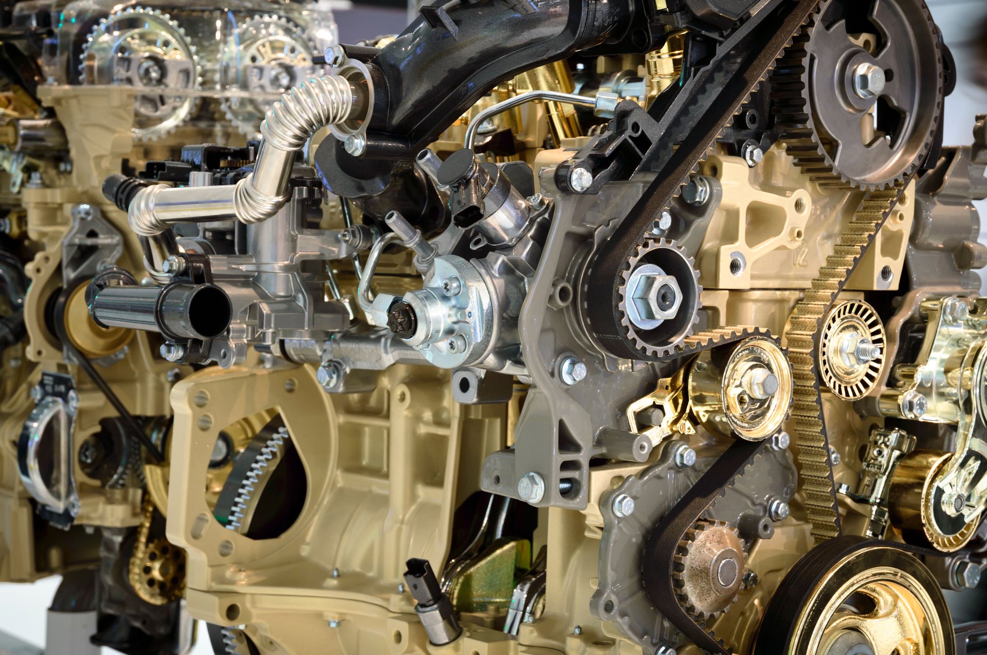 Genuine and OEM diesel engine spare parts on a workbench